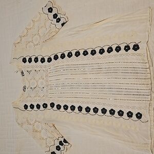 Anthropologie Floreat top, beaded, lace, sequins, and stones on flowers.